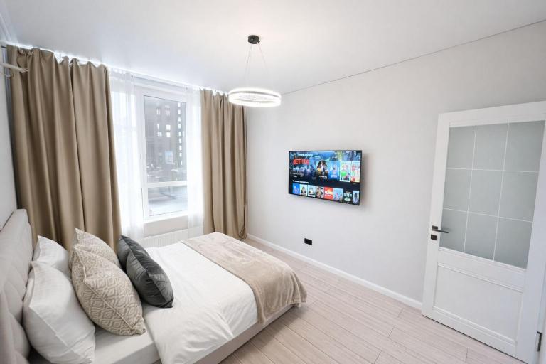 Стильные апартаменты в ЖК Eleven Хан Шатыр 10 минут - B&B Astaná