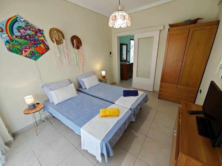 Evan's beach house - Chambres d'hôtes Néa Plágia