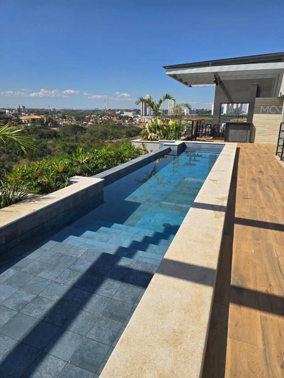 Cozy Moov Smart Apartamento - Chambres d'hôtes Cuiabá