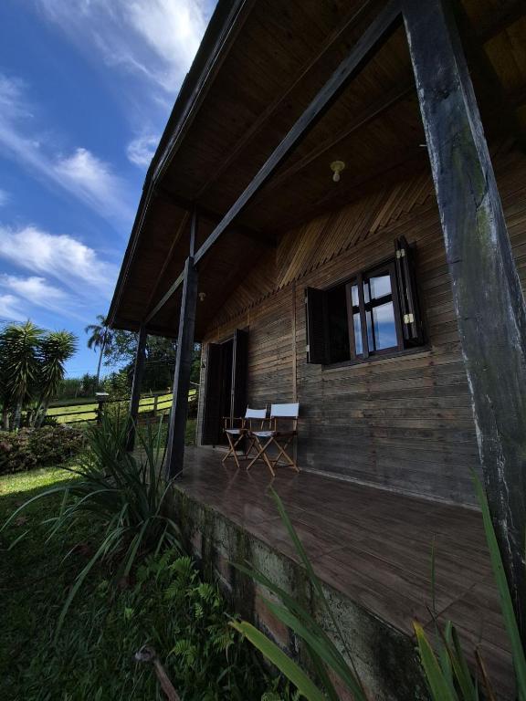 Casa no morro da Borussia com vista para eólicas - Chambres d'hôtes Osório