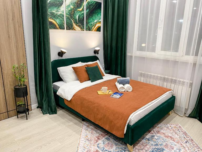 Contento Apartments - B&B Almaty