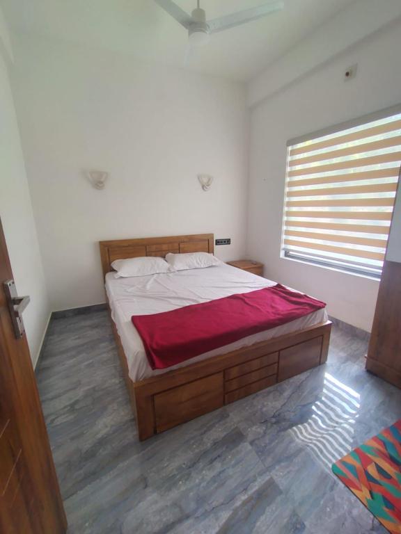Poozhikuth Homestay - B&B Ganapathivattam