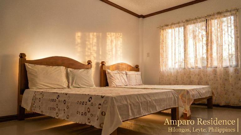 Amparo Residence, Makiling Room - Ferienwohnung Hilongos