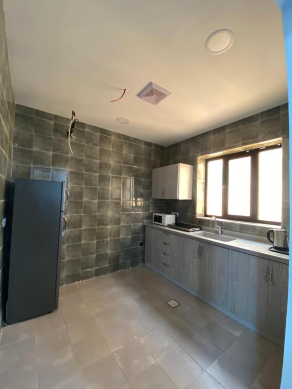 شقة مرفق ضيافة - Chambres d'hôtes Al Ḩusayy