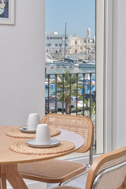 Appartamento vista mozzafiato sul porto di Trani - Chambres d'hôtes Trani