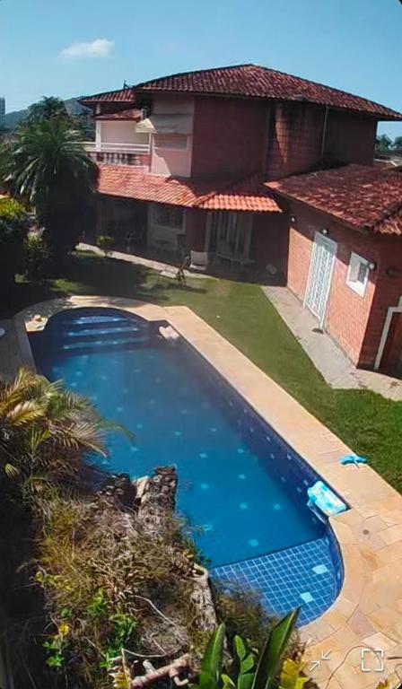 Quartos com suite em casa de praia com piscina - Ferienwohnung Guarujá