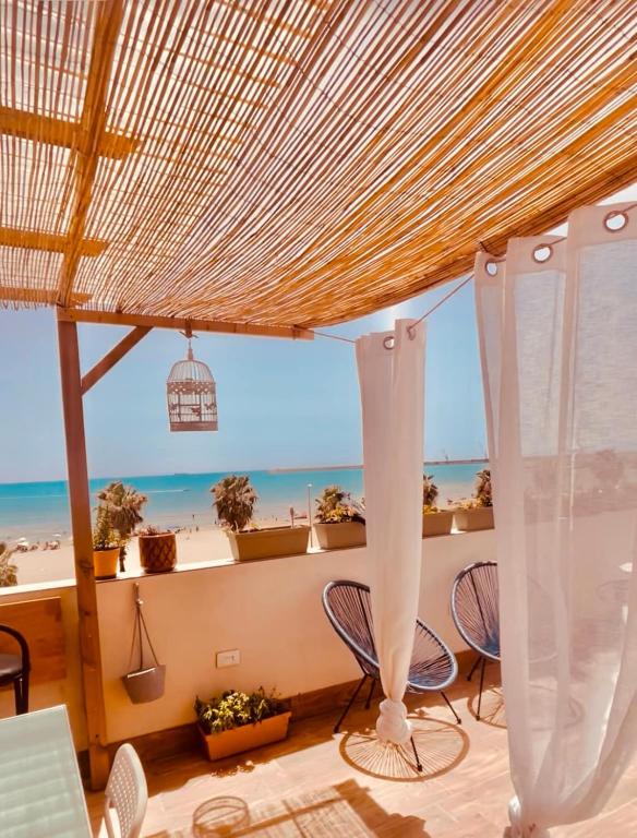 Suite do Mar Pozzallo Holidays house in front of the beach - B&B Pozzallo