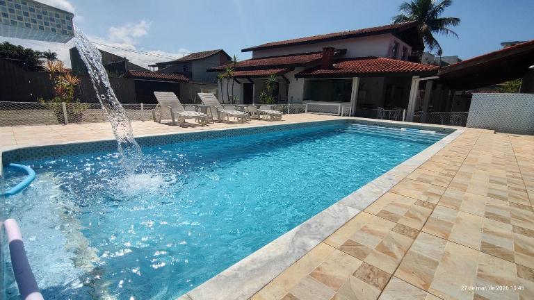 Casa piscina pé na areia Bertioga - Bed and Breakfast Bertioga