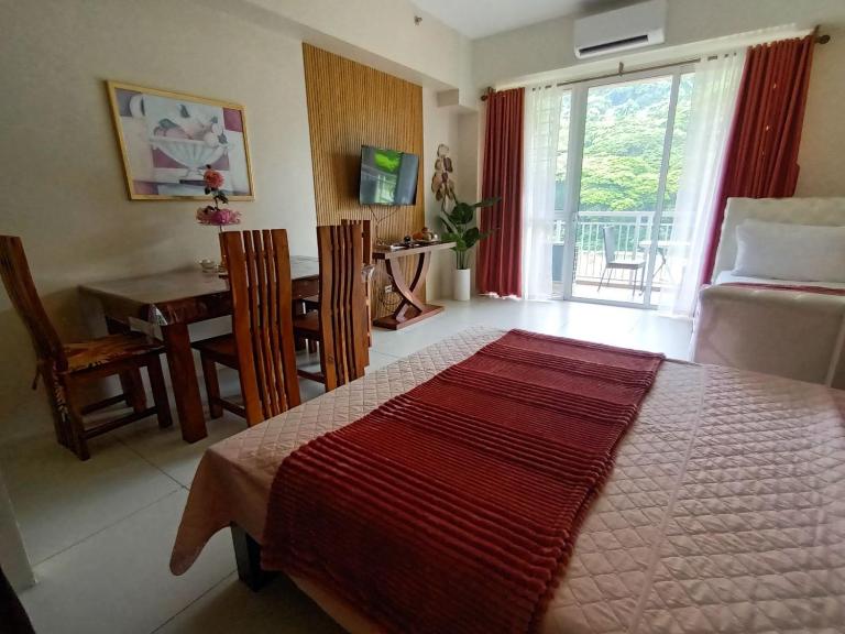 Shirley Pico de Loro 1BR - Chambres d'hôtes Nasugbu