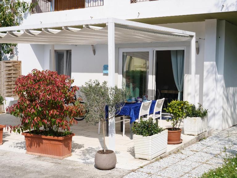 Minerva - bilocale indipendente, posto auto e bici - B&B Grado