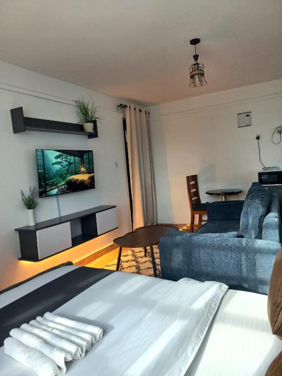 Modern Grey Haven Stylish Studio - Chambres d'hôtes Nairobi