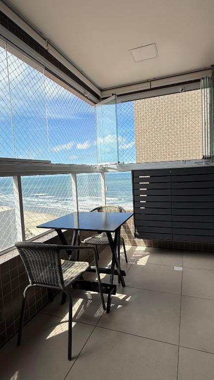 Apartamento Pé na Areia com Churrasqueira Carvão Wi Fi Grátis - Bed and Breakfast Praia Grande