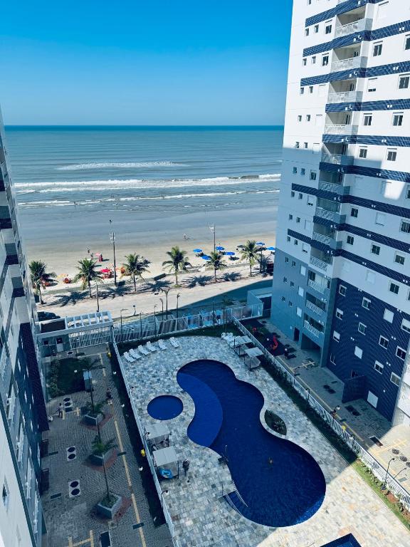 Apto frente o mar com 3 piscinas descanso para família aceito pet - Chambres d'hôtes Mongaguá