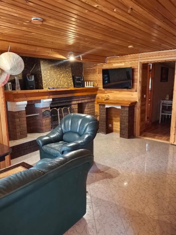 Дом у моря - Chambres d'hôtes Suurupi