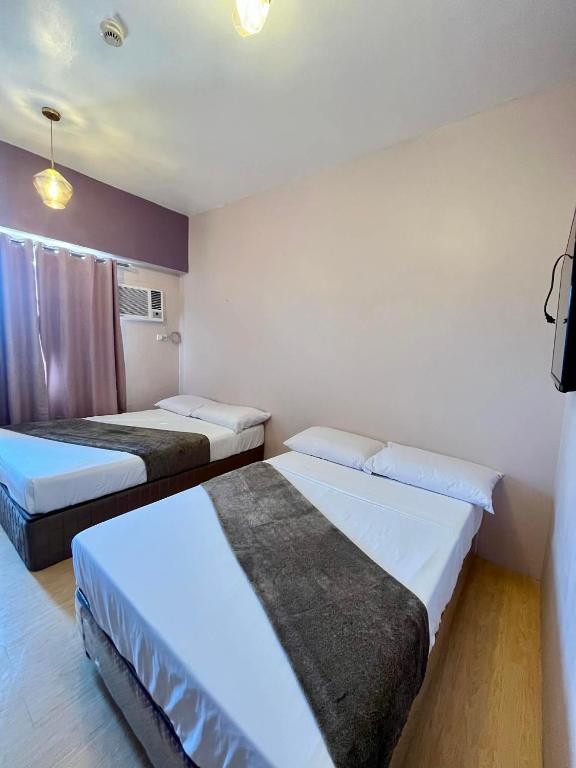 Deluxe Twin Bed at Sunvida Tower across SM CITY - B&B Cebu City