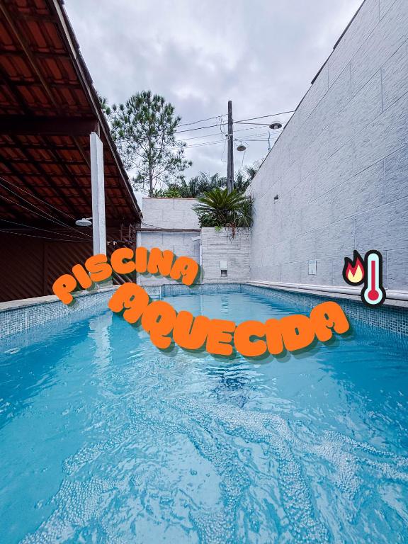 Casa Sossego Com Piscina Aquecida, Hidro e Cascata - Bed and Breakfast Peruíbe