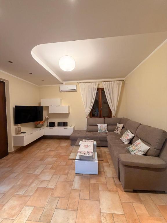 La Casa delle Rose - In Centro di Santa Maria degli Angeli con il Parcheggio Privato - Chambres d'hôtes Santa Maria degli Angeli