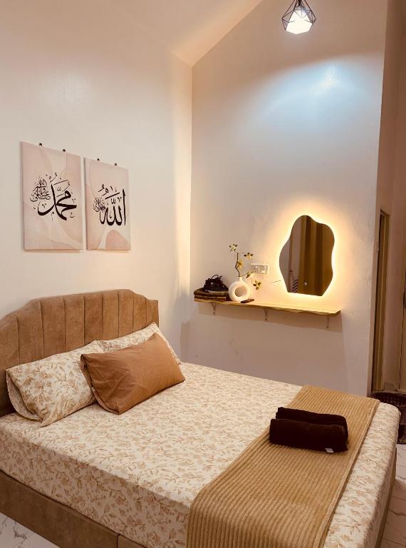 Aila Roomstay TTHI - B&B Kampong Titi Haji Idris