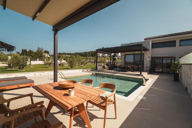 Four Stones Villas - Ferienwohnung Pefkochori