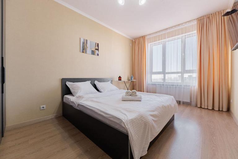 Апартаменты с видом на город на 18 этаже в районе Ханшатыра - B&B Astana