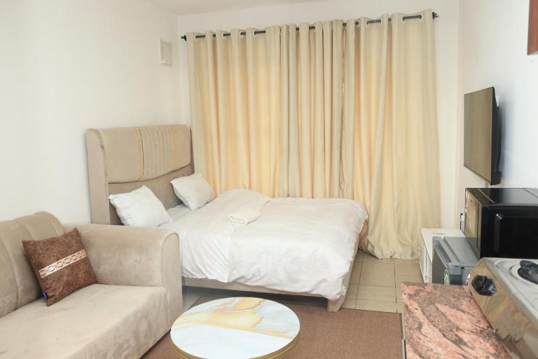 Studio Apartment Jiji Poa Ruaka Room 405 - Chambres d'hôtes Ruaka