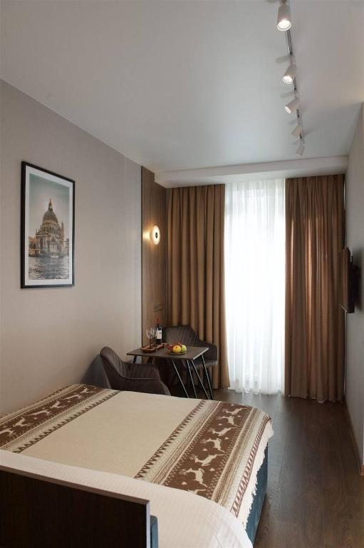 Стильні апартаменти з балконом в центрі міста - Ferienwohnung Kyjiw
