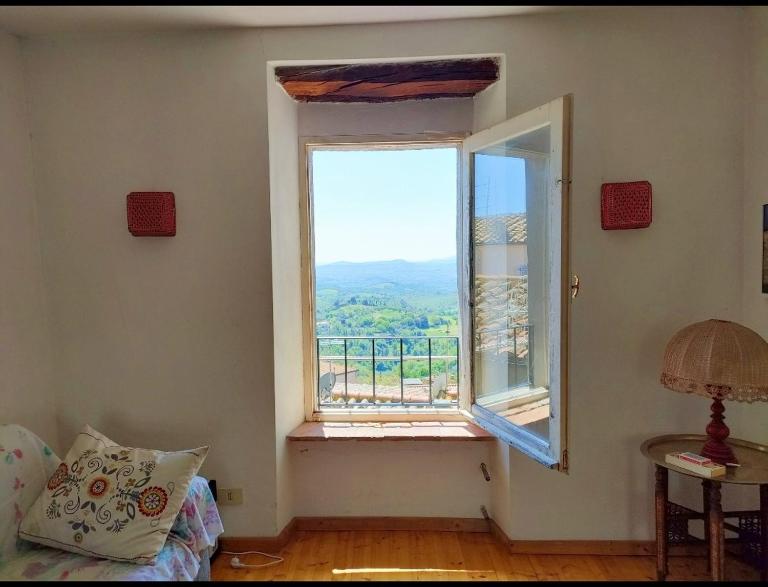 Aldina, Apartment in historic center with view - Chambres d'hôtes Manciano
