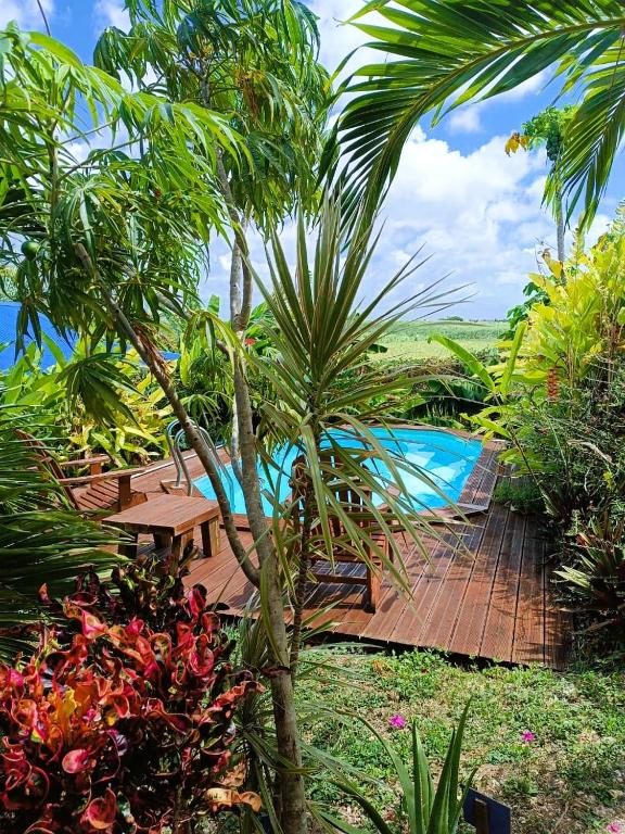 Gites kaz à klemence - Bungalow karapat - jacuzzi privé et piscine au cœur de la nature à Anse-Bertrand - Ferienwohnung Anse-Bertrand