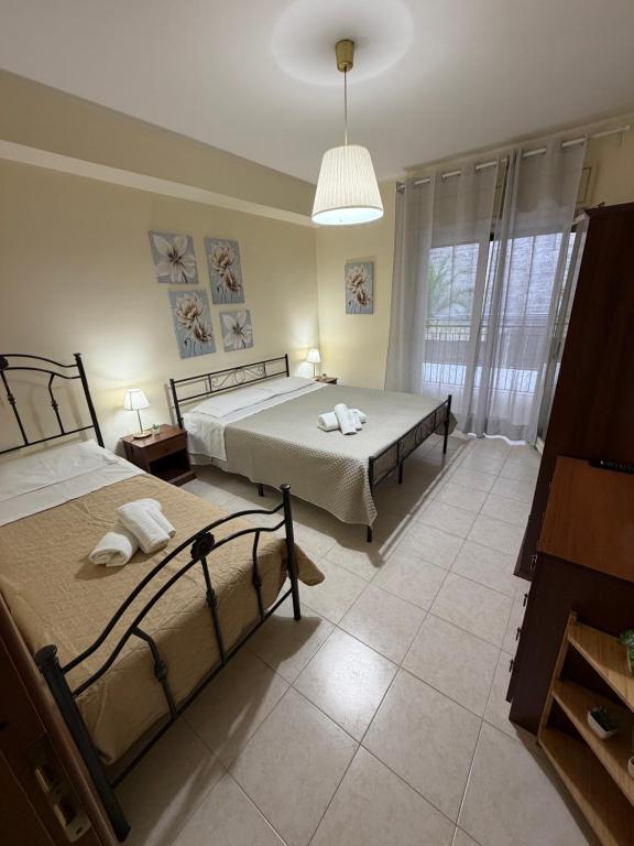 Casa vacanze, a due passi da Taormina (ME) - Chambres d'hôtes Letojanni