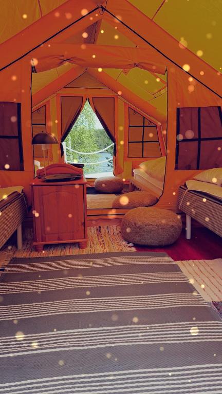 Glamping tält/tent - Glampingzelt -Lodge - Sjöutsikt - B&B Blattniksele