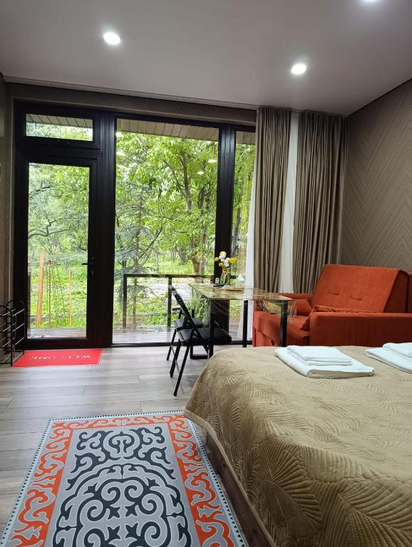 Ganbar Guest Houses - Ferienwohnung Ak-Suu
