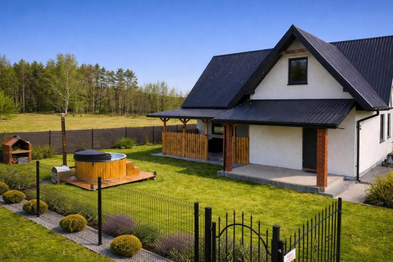 Całoroczny dom wypoczynkowy pod Lasem z prywatnym jaccuzii - Ferienwohnung Wytyczno