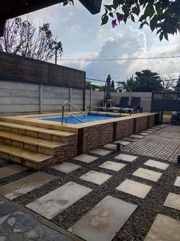 Casa con piscina climatizada para 6 personas en Parque del plata - Chambres d'hôtes Parque del Plata