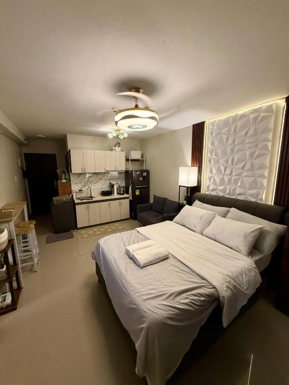Newly Renovated Condominium in Lapu-Lapu - Condo De Familia Campanilla - Bed and Breakfast Looc