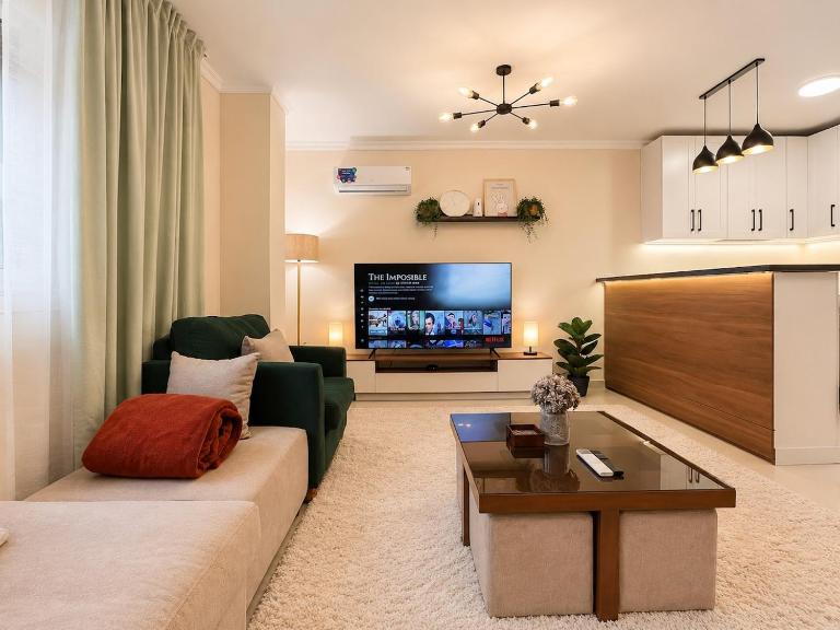 Cozy 1BR Apartment with GardenView - Chambres d'hôtes Le Caire