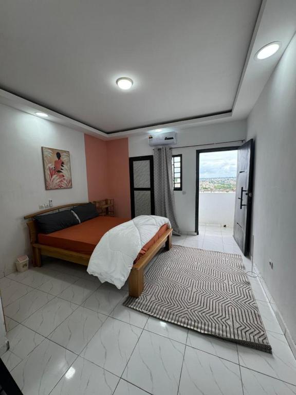 Cosy appartement chambre salon au 2 plateaux - Bed and Breakfast Abidjan