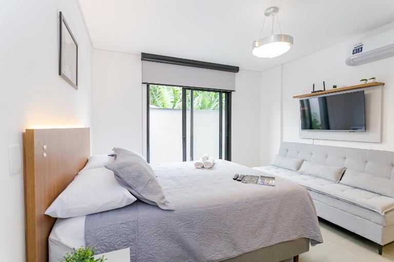 Apartamento 101 - Eixo · Studio c/ Garden Privativo e Cozinha Completa - Ferienwohnung Curitiba