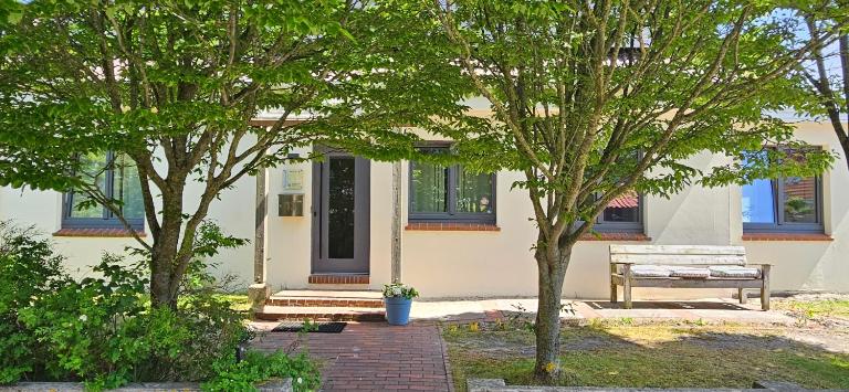 Haus Knutt aus Wangerooge - Erdgeschosswohnung mit Garten - Ferienwohnung Nordseeheilbad Wangerooge