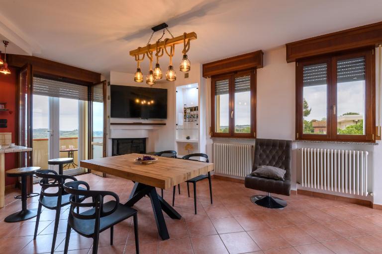 GuestHost - Rosso Tramonto Flat with Relaxing View - Chambres d'hôtes Tavullia