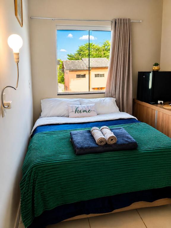 Quarto confortável em residência Familiar - WiFi - Netflix -Frigobar próx ao Aeroporto - B&B Navegantes