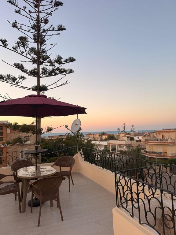 The Lotus Inn Luxury Duplex Rooftop Sea View - Bed and Breakfast El Alamein