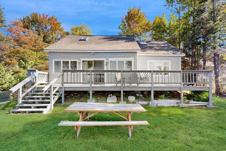 Lakefront home with private dock, mooring, pebble beach, grill, & firepit - B&B Kokadjo