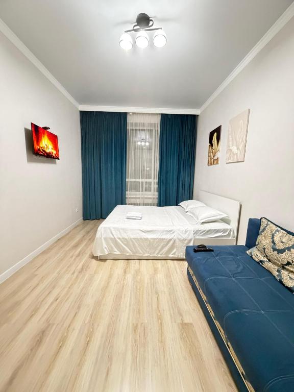 Alpamys A4 by Capital Apartments - Ferienwohnung Astana