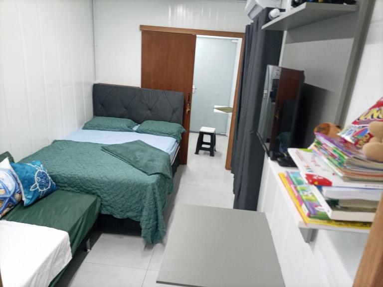 Casa do Tião Refugio em Container 50metros do mar, 15km Beto Carrero e 3km do Aeroporto e Porto de Navegantes Centro da Cidade NÃO RECEBEMOS FUMANTES - Chambres d'hôtes Navegantes