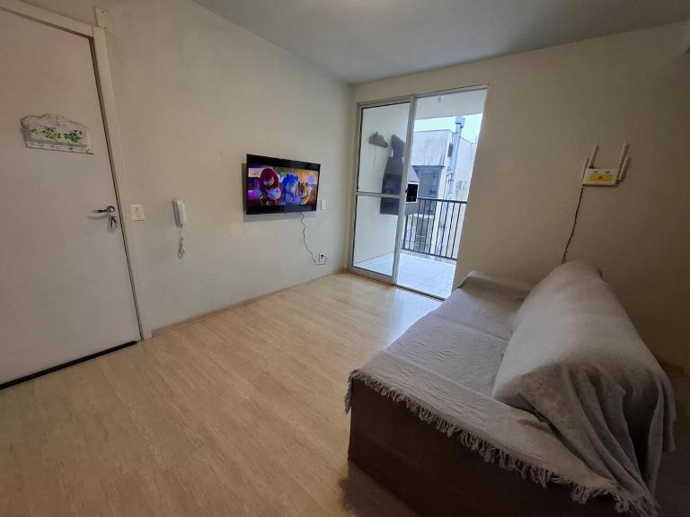 Apartamento com sacada, estacionamento e piscina - Ferienwohnung São Leopoldo