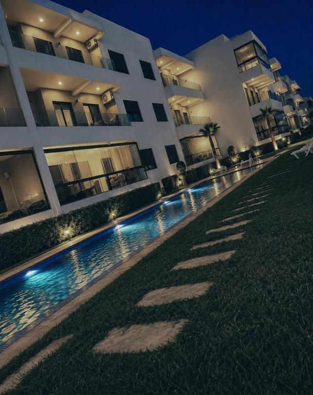 Magnifique appartement calme et de prestige de 108 m, 3 PISCINES, 2 min PLAGE, Le BEST pour vos vacances - Ferienwohnung Sidi Rahal