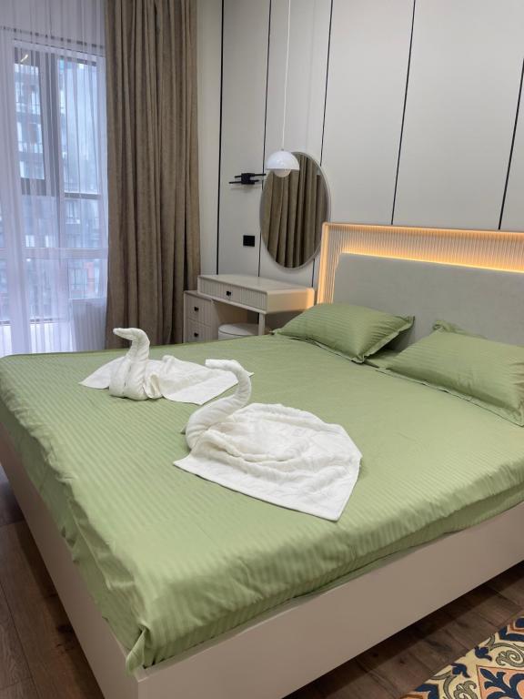 Apartment Almaty next to Metro & Chocolate 56кв м - B&B Almatý