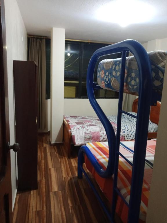 Agua caliente parqueadero cocina completa - B&B Baños