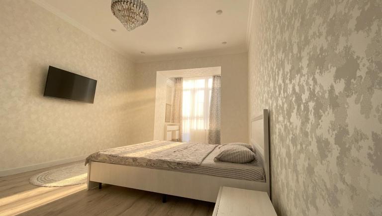 Уютная однушка в мкр Батыс-2 - B&B Aktobe