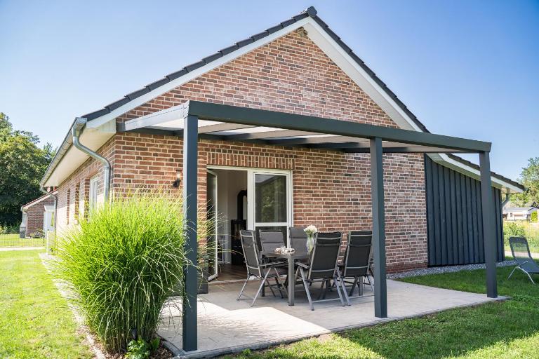 Haus KüstenBrise - Urlaub mit Hund an der Küste mit eigenen Garten, Sauna und gemütlichen Kaminfeuer - Ferienwohnung Schweiburg